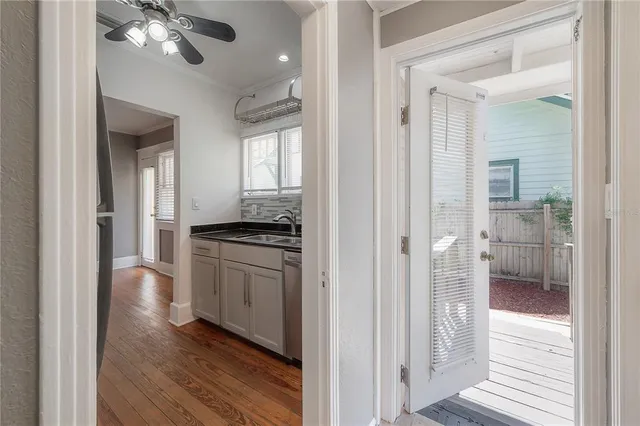 a view of a kitchen from the hallway