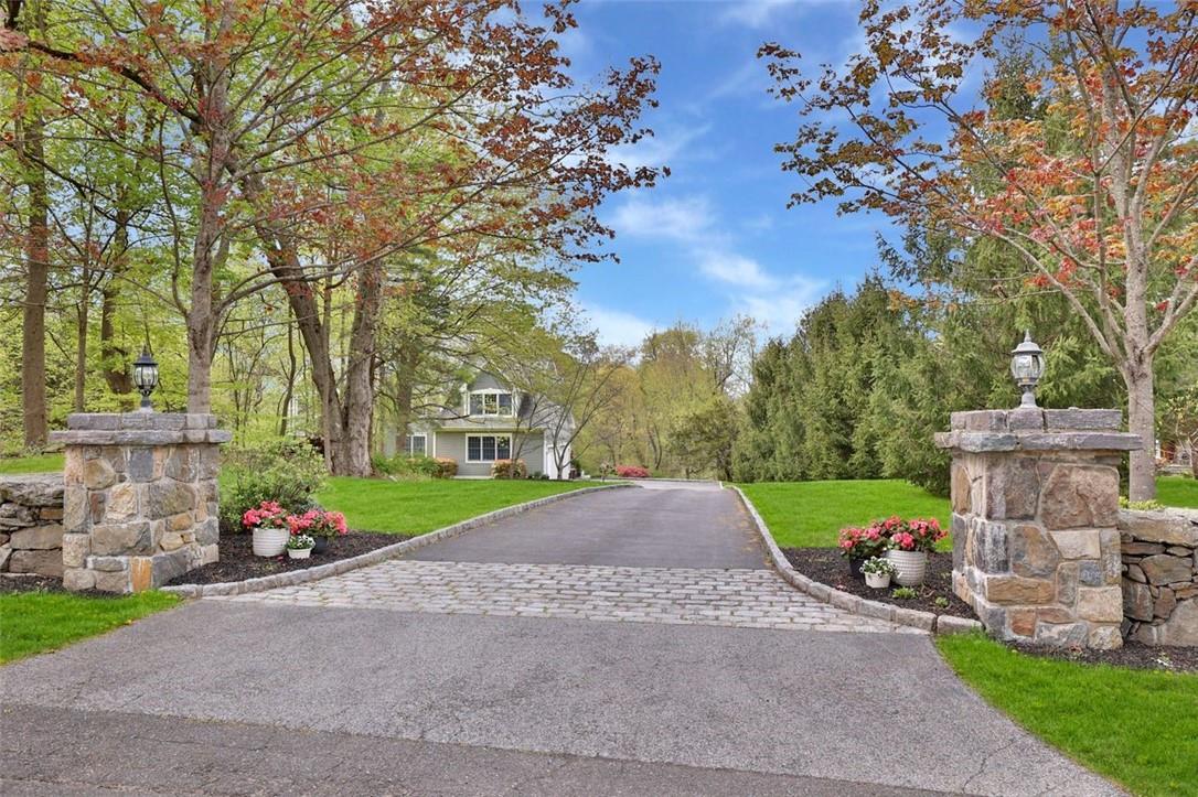 121 Pinesbridge Road Ossining, NY 10562 - Photo 1 of 1 a front view of a house with garden