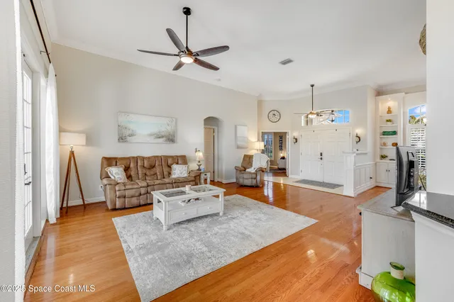 a bedroom with a bed and a night stand