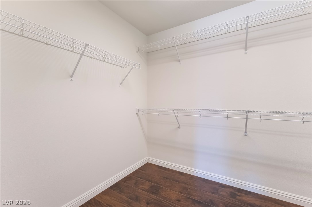 3175 Via Seranova Henderson, NV 89044 - Photo 26 of 45 This spacious closet features ample storage with wire shelving and rich hardwood flooring.