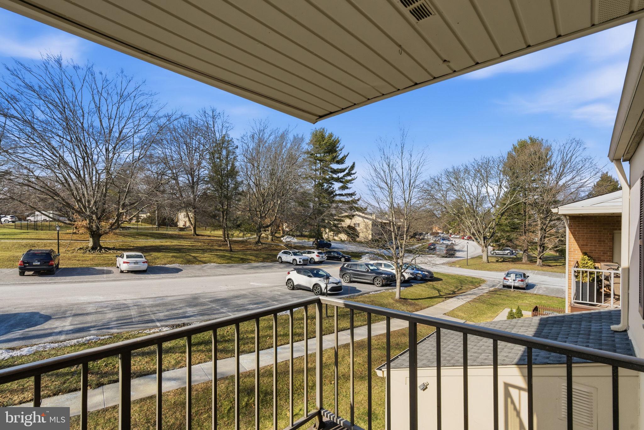 463 Old Forge Crossing Devon, PA 19333 - Photo 18 of 21 a view of a street with chairs and wooden fence