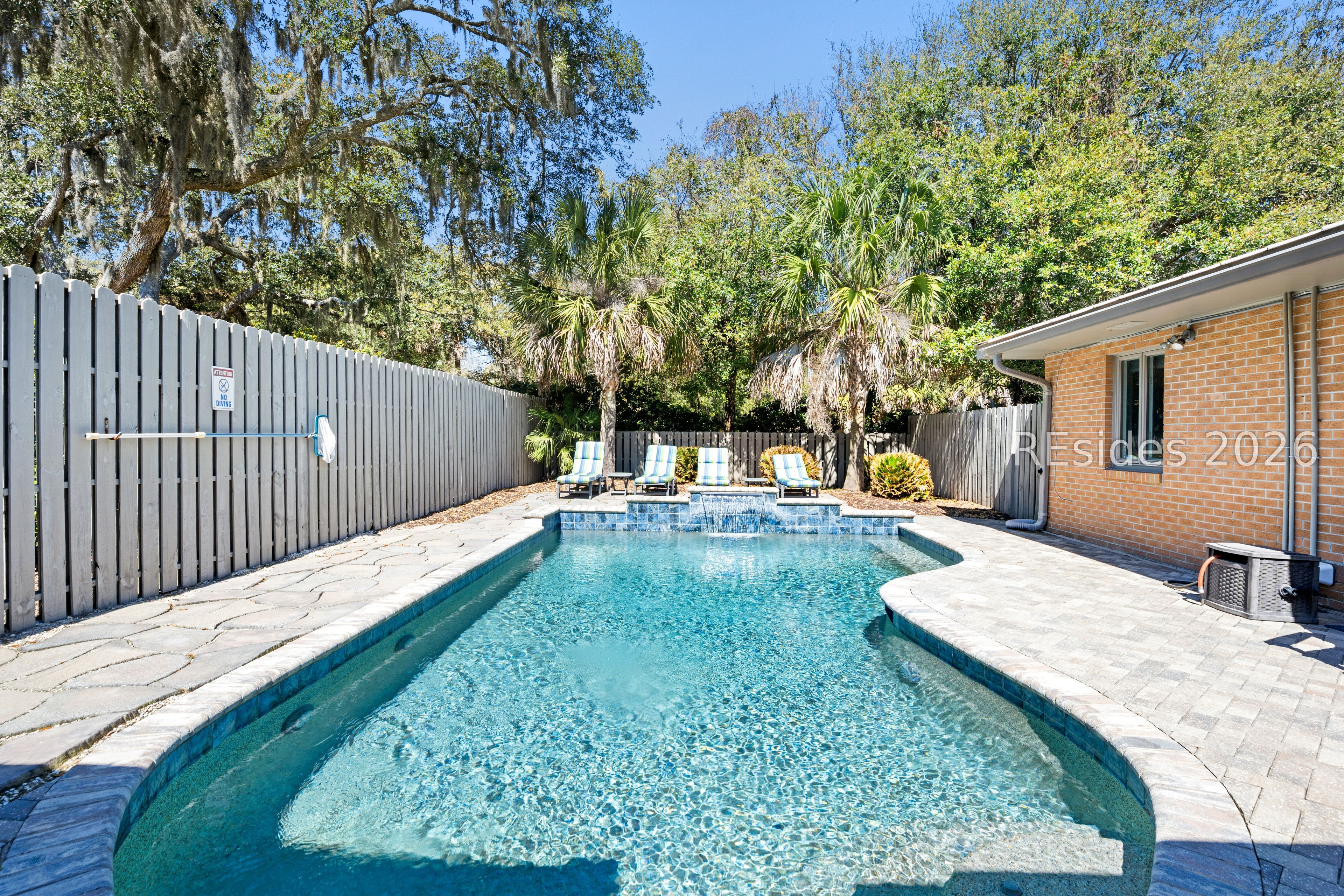2 Night Hawk Street Hilton Head Island, SC 29928 - Photo 2 of 56 Cool off in the water or lounge on the paver patio
