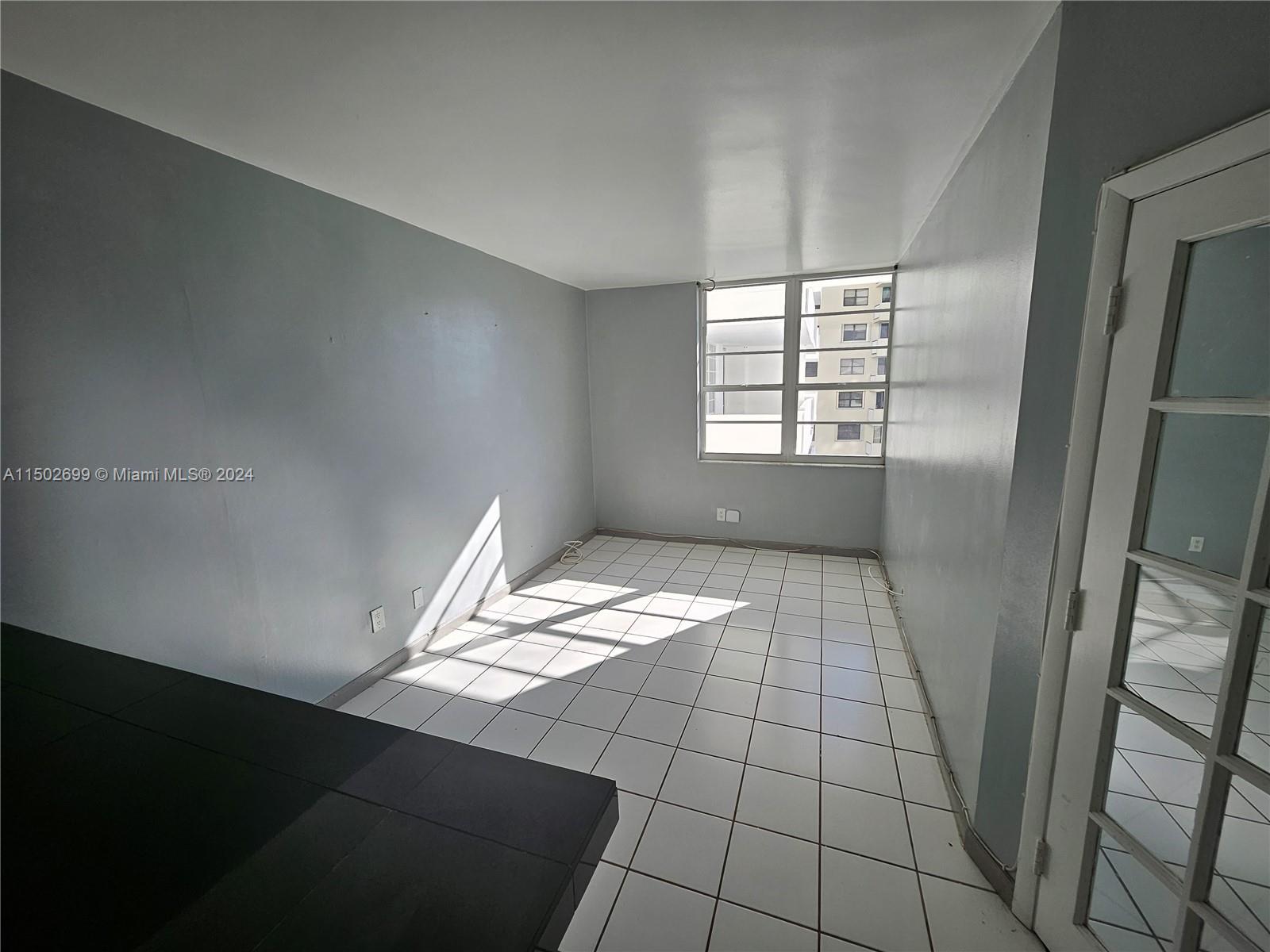 a view of empty room with window