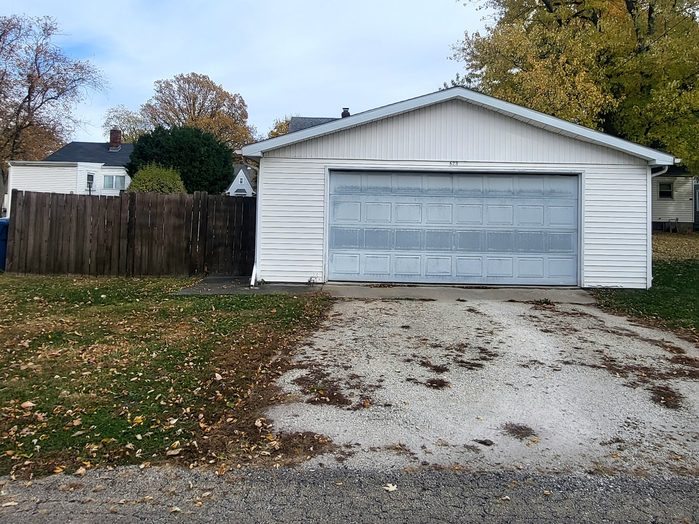 623 South Yates Avenue Kankakee, IL 60901 - Photo 17 of 17 a front view of a house with a yard and garage
