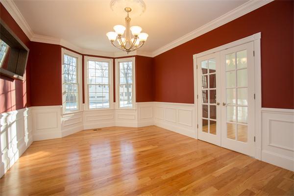 65 Ivy Road Wellesley, MA 02482 - Photo 8 of 9 a view of an empty room with wooden floor and a window