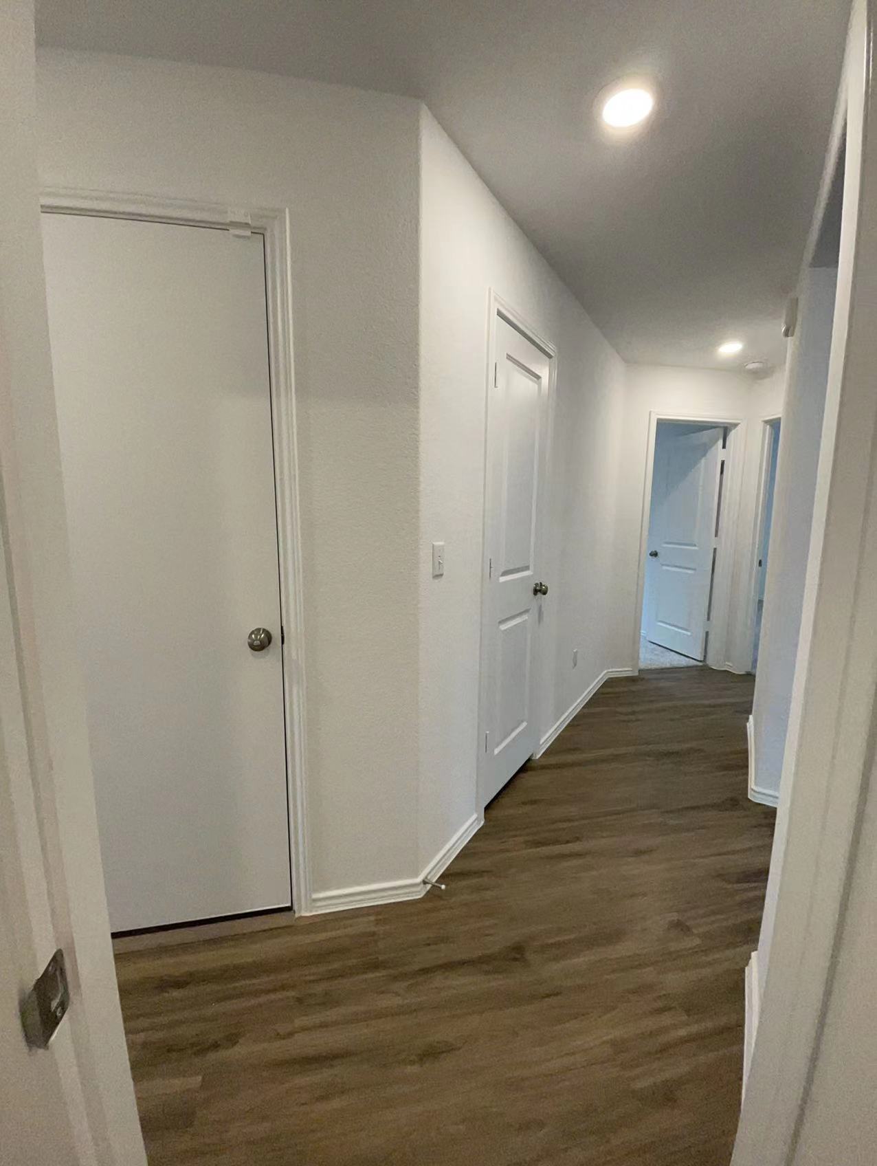 125 Madrid Kyle, TX 78640 - Photo 12 of 23 Hallway with dark wood finished floors and recessed lighting