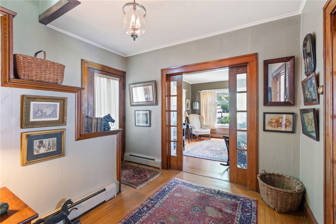 4007 Ridge Road Williamson, NY 14589 - Photo 16 of 34 The charm of VINTAGE STYLE POCKET DOORS! One can just feel the love that the owners have had for this home!
