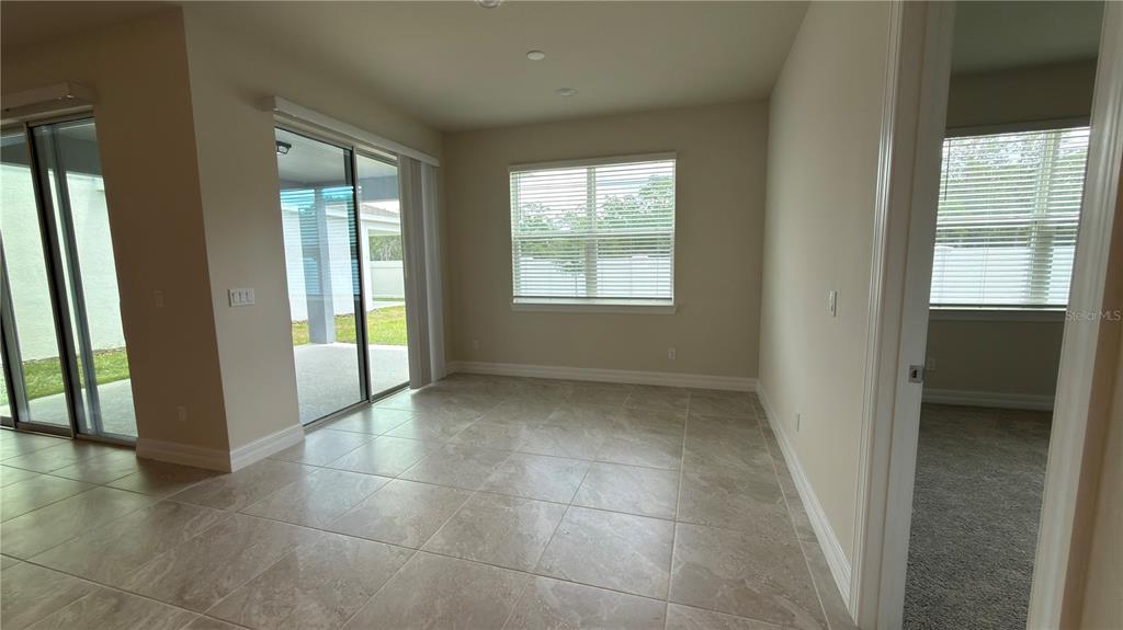 1523 Groveline Road St. Cloud, FL 34771 - Photo 15 of 30 a view of an empty room with a window