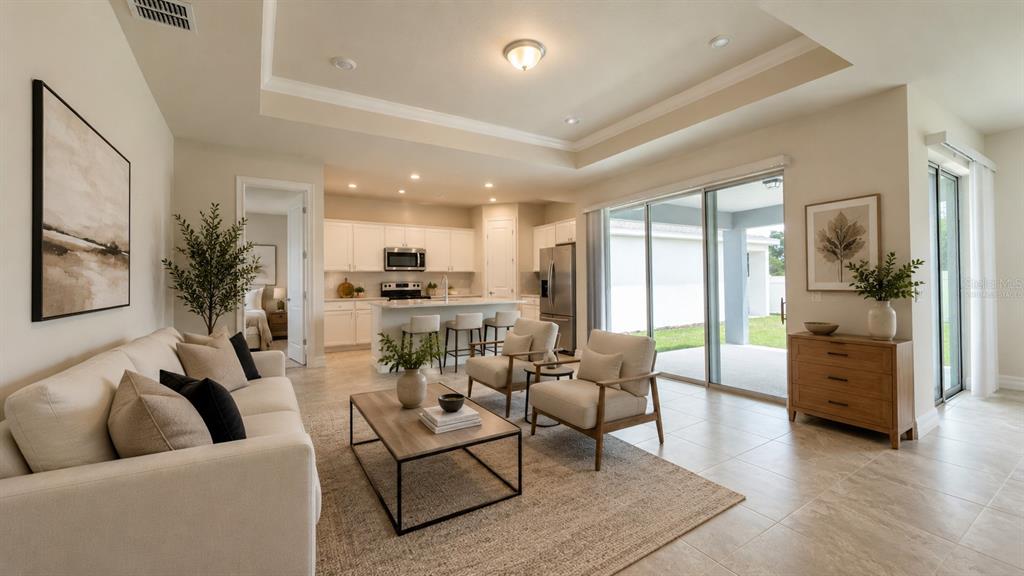 1523 Groveline Road St. Cloud, FL 34771 - Photo 2 of 30 a living room with furniture and a large window