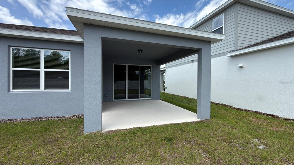 1523 Groveline Road St. Cloud, FL 34771 - Photo 24 of 30 a view of backyard with large tree