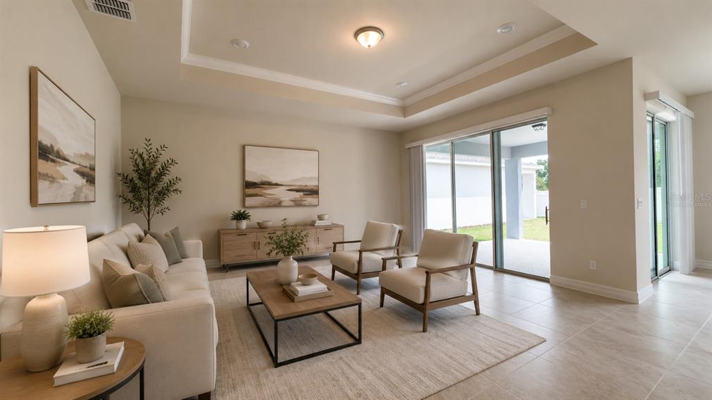 1523 Groveline Road St. Cloud, FL 34771 - Photo 5 of 30 a living room with furniture and wooden floor