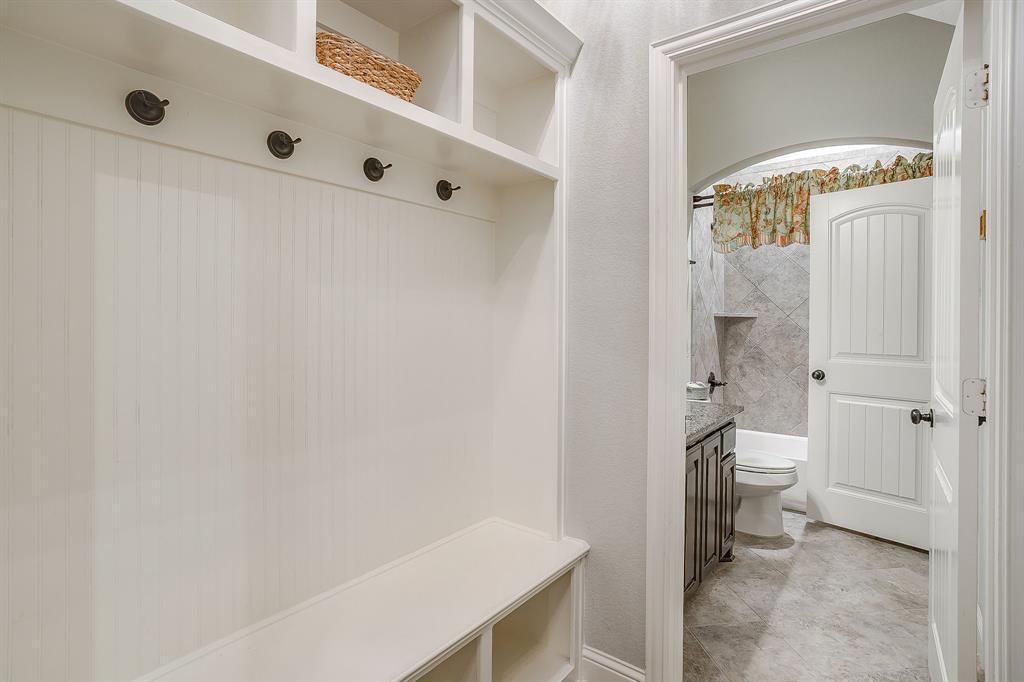 329 Madison Street Burleson, TX 76028 - Photo 31 of 40 a bathroom with a toilet sink and shower