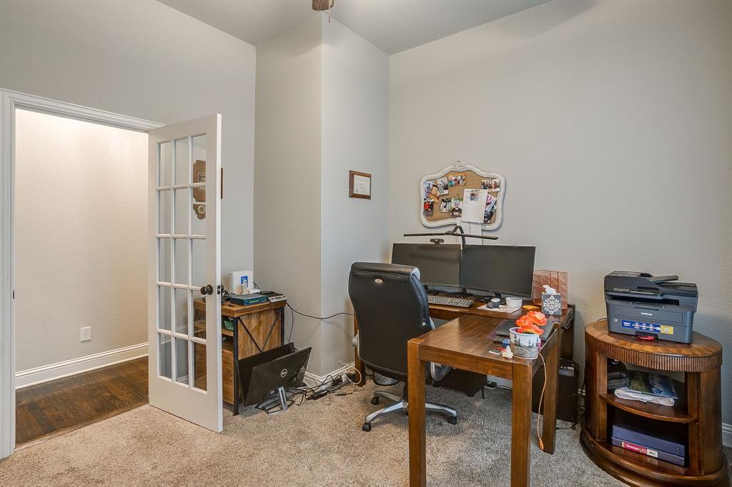 329 Madison Street Burleson, TX 76028 - Photo 7 of 40 a workspace with furniture and a window