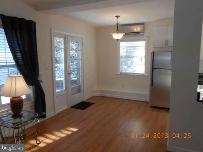 3203 Gunston Road, Unit 11032 Alexandria, VA 22302 - Photo 3 of 20 a view of livingroom with furniture and a window