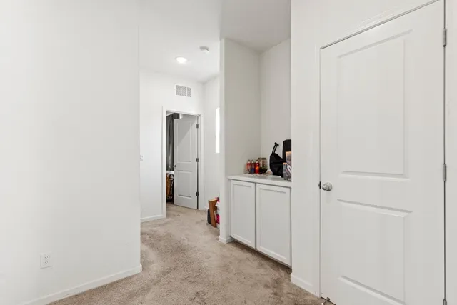 a room with a closet and a mirror