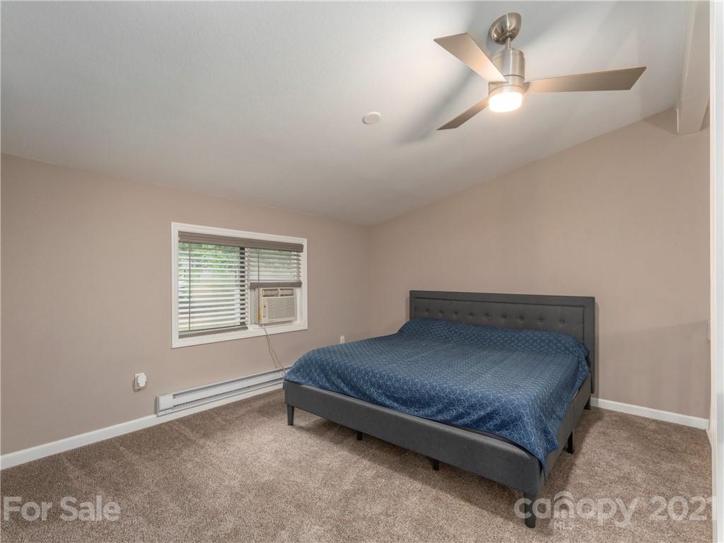 79 Susan Drive Maggie Valley, NC 28751 - Photo 13 of 17 a room with a bed and window