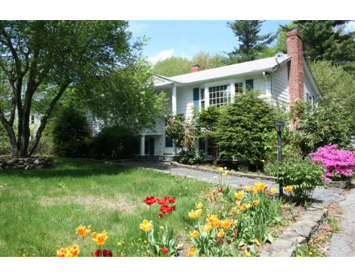 20 Whittier Road Billerica, MA 01821 - Photo 1 of 1 a view of a house with a big yard and potted plants