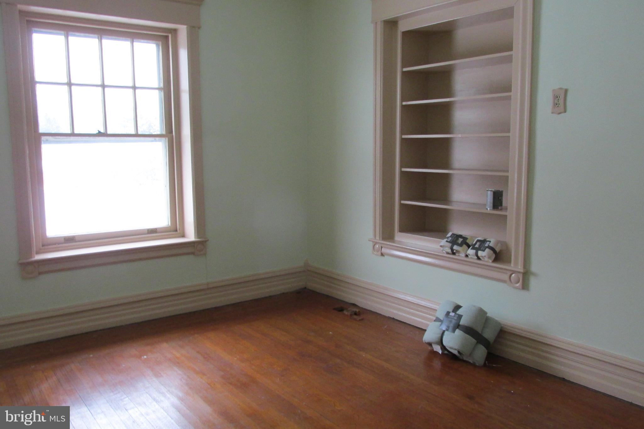 702 Mount Laurel Road Temple, PA 19560 - Photo 22 of 33 a room with toys and a window
