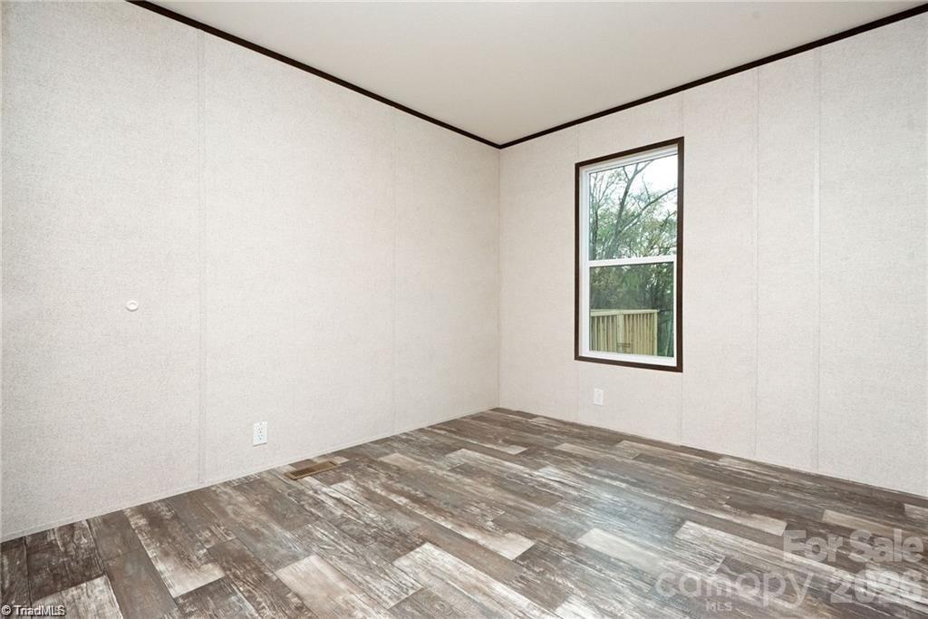 1975 Carl Fox Road Taylorsville, NC 28681 - Photo 20 of 33 a view of a bedroom with a window