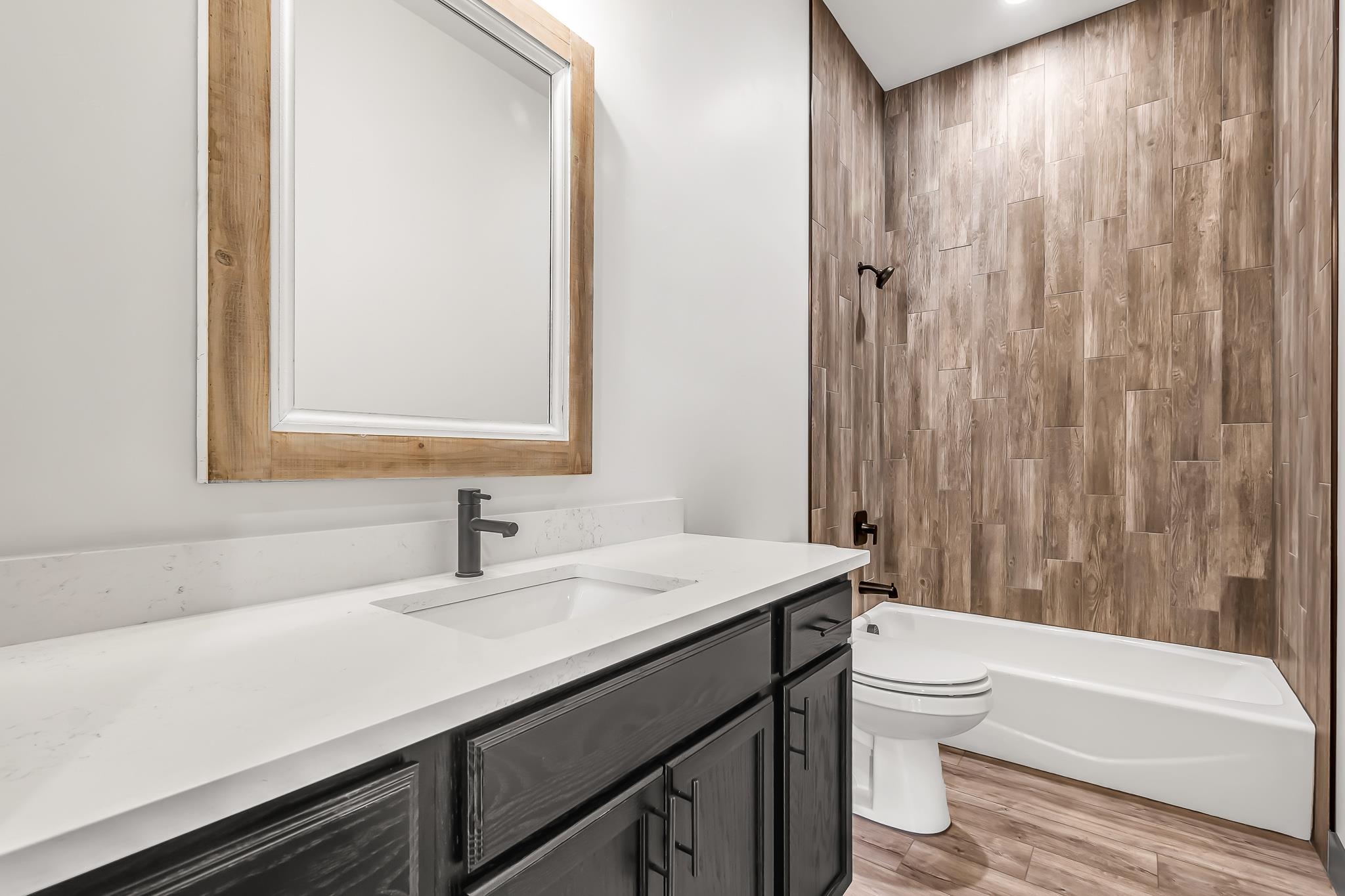 796 Spur Cross Road Grand Junction, CO 81505 - Photo 19 of 24 a bathroom with a sink a toilet and a bathtub