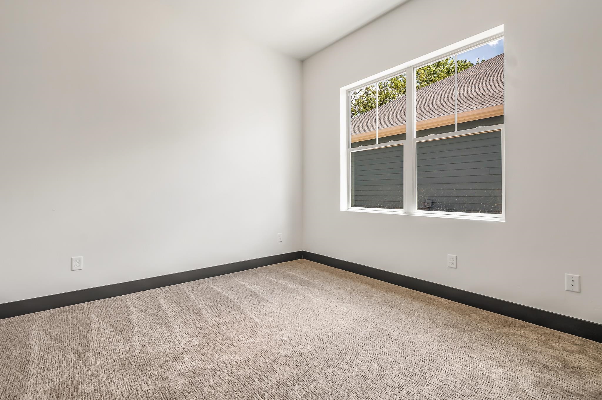 796 Spur Cross Road Grand Junction, CO 81505 - Photo 20 of 24 an empty room with a window