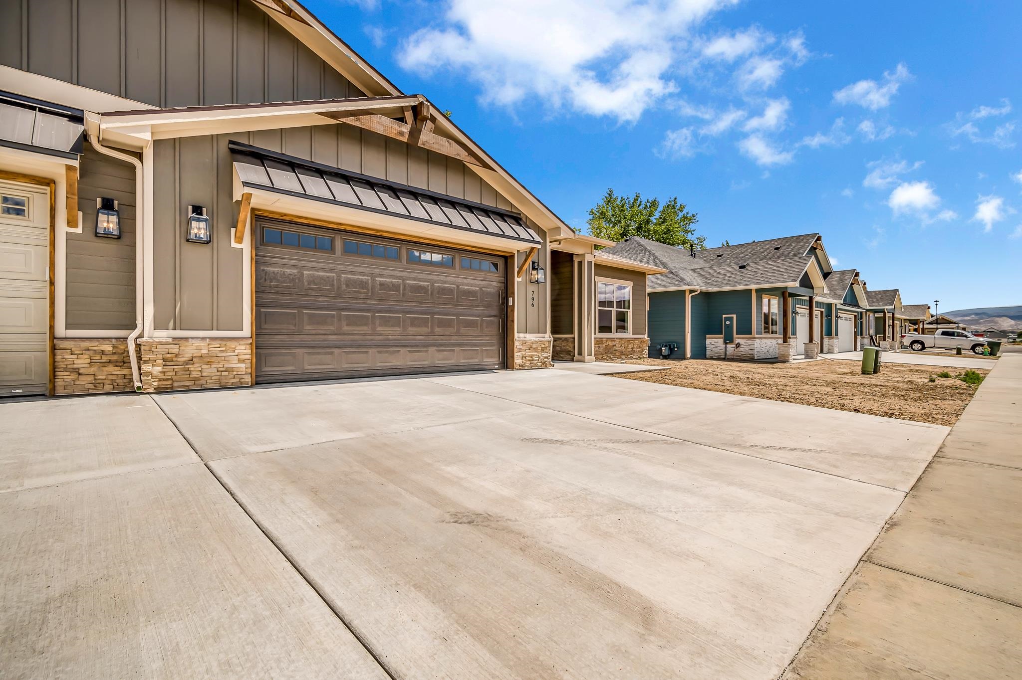 796 Spur Cross Road Grand Junction, CO 81505 - Photo 3 of 24 a view of a house with a barbeque
