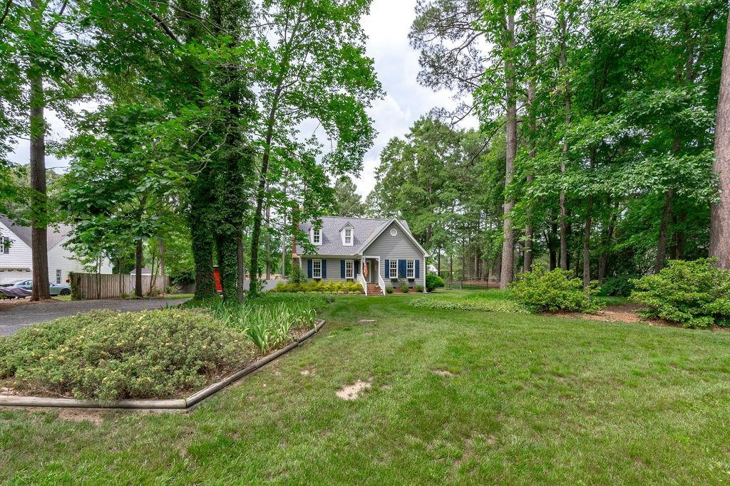 5208 Rivington Road Fuquay-Varina, NC 27526 - Photo 2 of 30 Enormous Front Yard Creating the Perfect Amount of Privacy