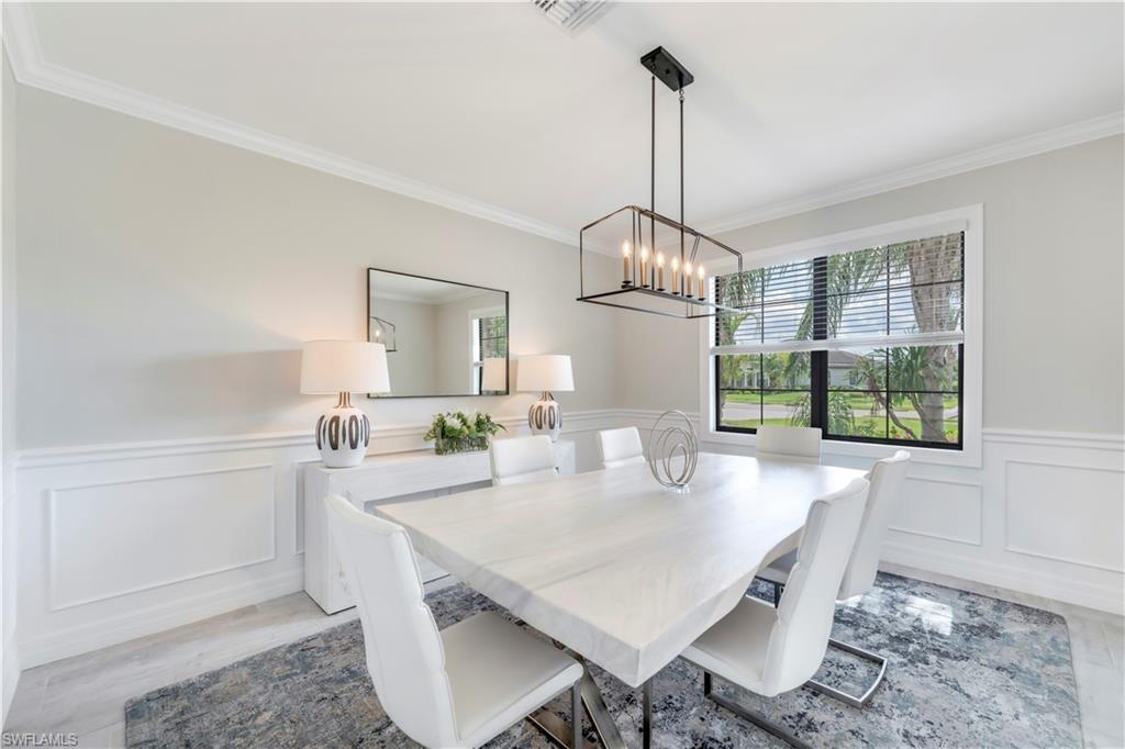 19128 Elston Way Estero, FL 33928 - Photo 18 of 50 a view of a dining room and livingroom view