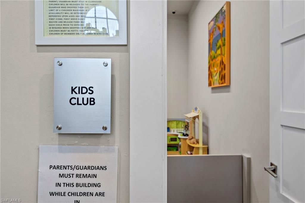 19128 Elston Way Estero, FL 33928 - Photo 50 of 50 a view of a hallway with a large window