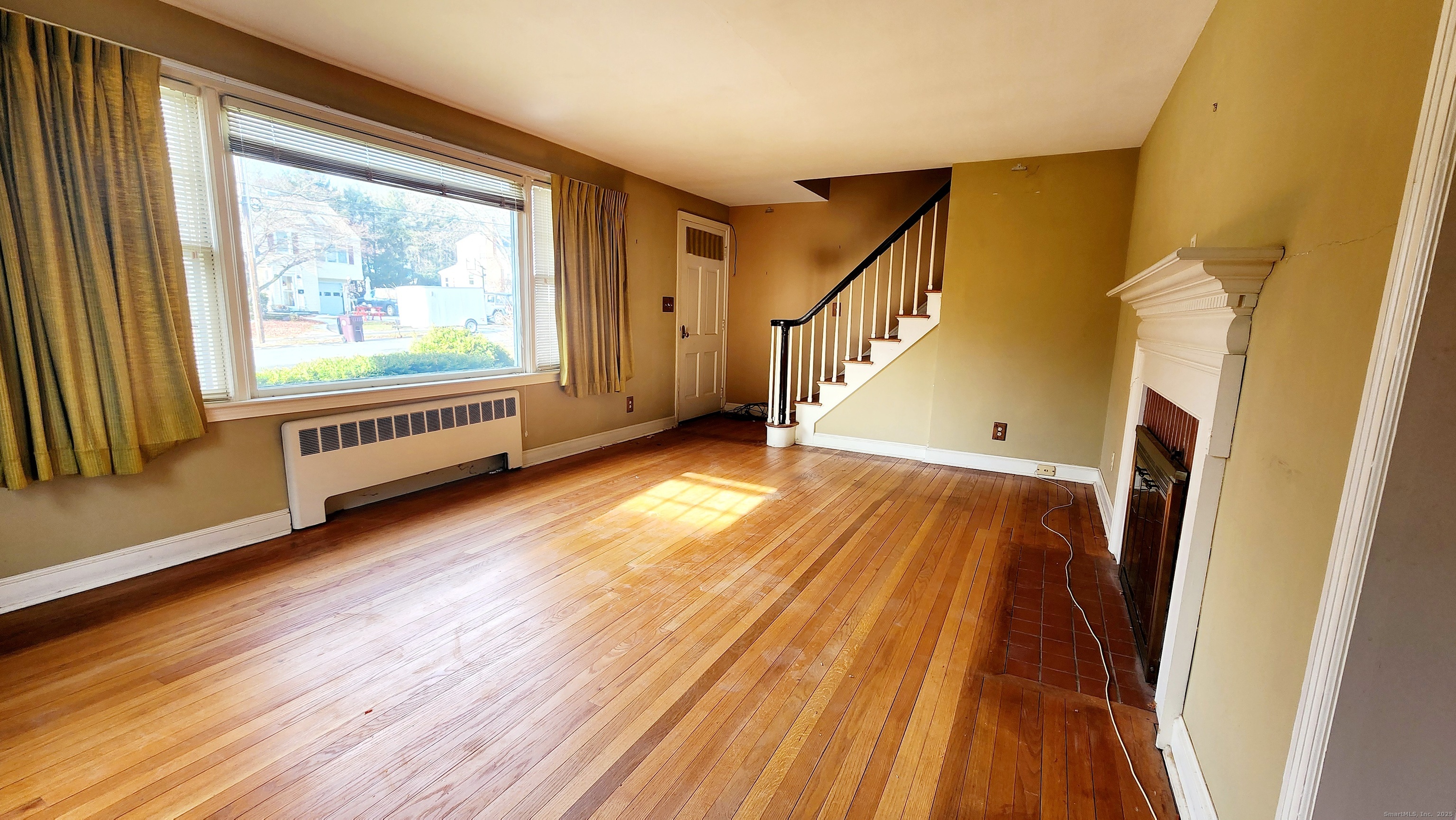 51 Tunxis Street New Britain, CT 06053 - Photo 3 of 18 a view of an entryway with wooden floor