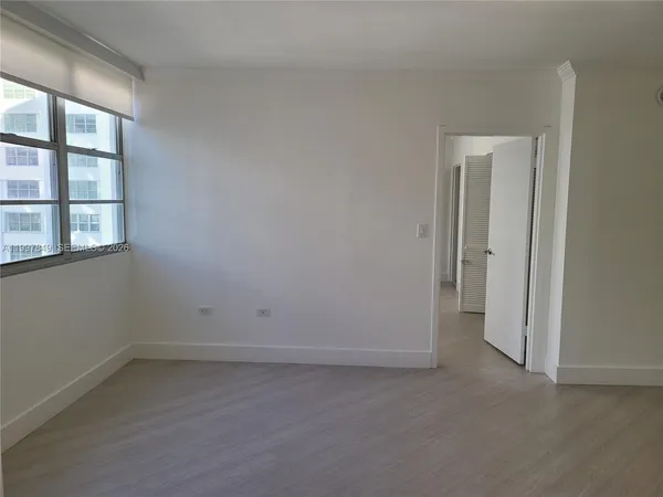 an empty room with a window
