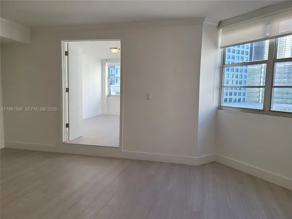 an empty room with a window