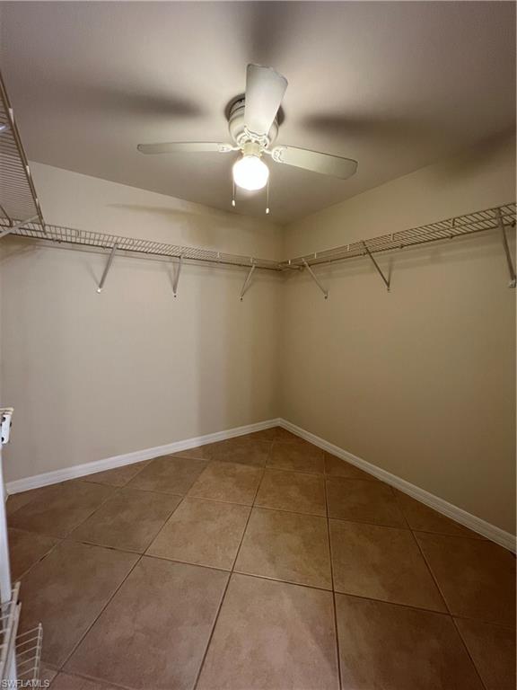 3471 County Barn Road, Unit F102 Naples, FL 34112 - Photo 11 of 19 a view of a room with racks on the wall