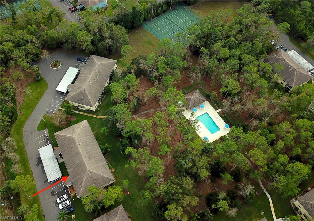 3471 County Barn Road, Unit F102 Naples, FL 34112 - Photo 3 of 19 an aerial view of a house with outdoor space and street view