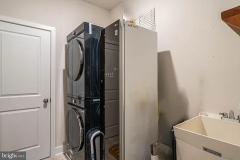 a bathroom with a shower and a mirror