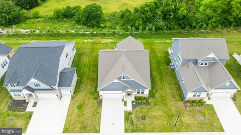 a view of a swimming pool with an ocean view