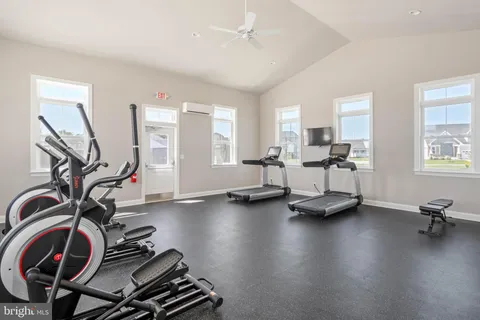 an aerial view of a kitchen with swimming pool