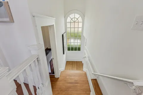 a view of a chairs and table in the room