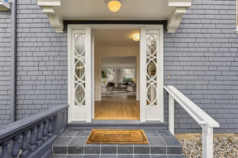 a living room with fireplace furniture and a flat screen tv