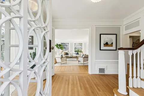 view of living room with patio furniture and potted plants