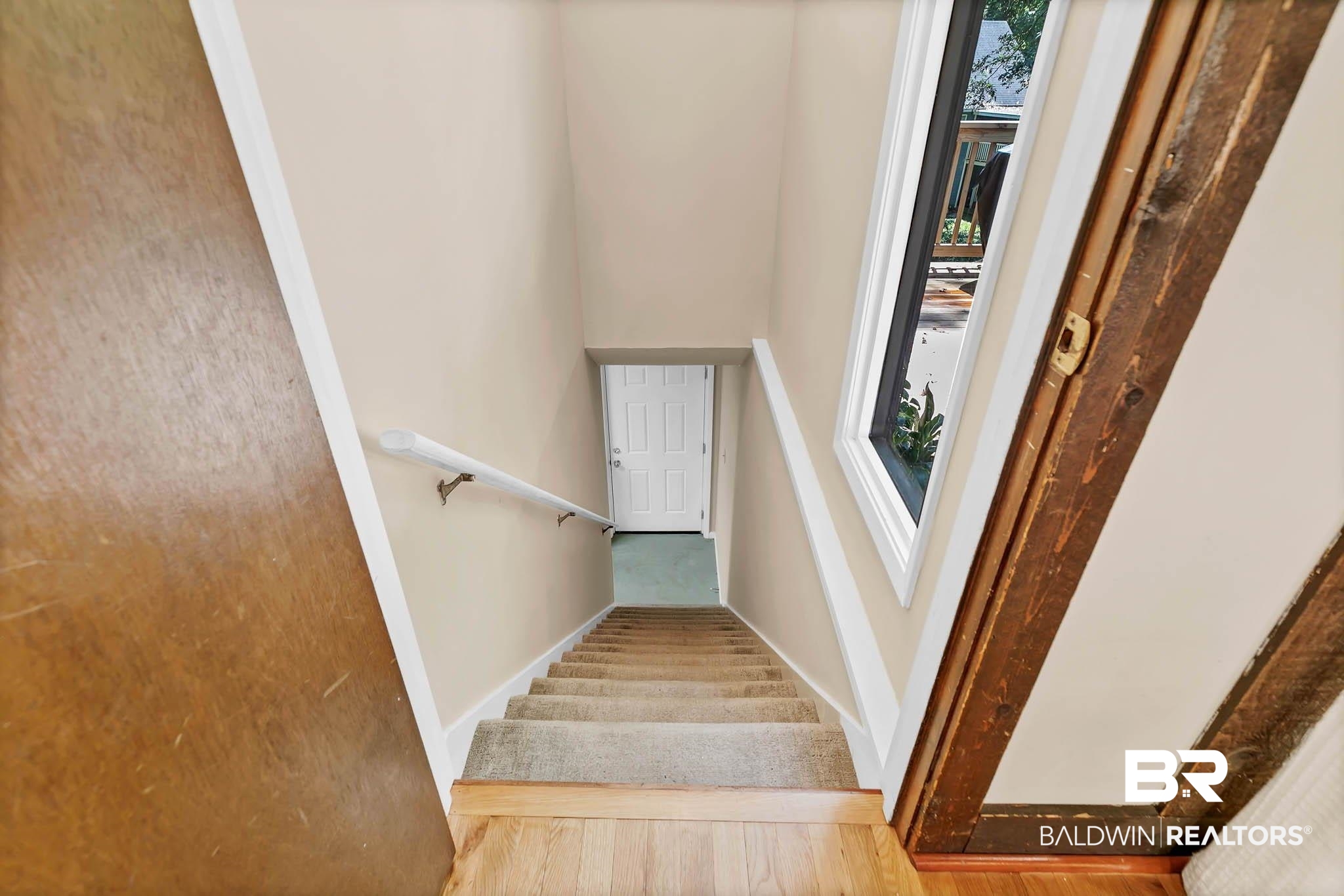 332 Ridgewood Drive Daphne, AL 36526 - Photo 30 of 48 Staircase with baseboards and wood finished floors