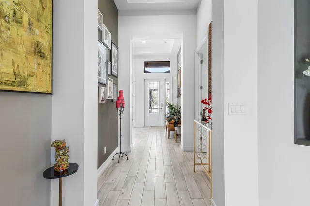 a view of entryway with wooden floor