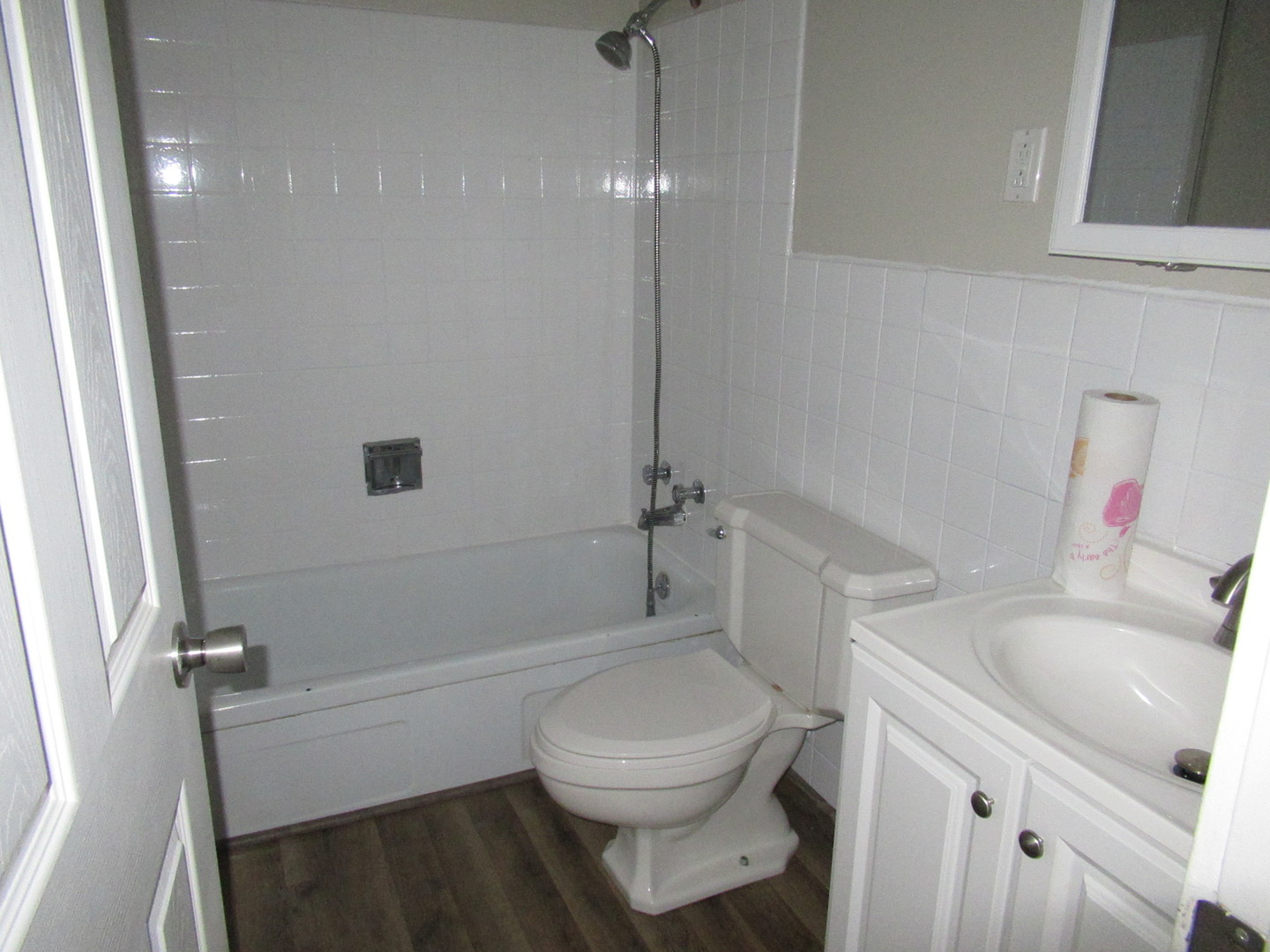 1563 South Pointe Drive Rantoul, IL 61866 - Photo 11 of 15 a bathroom with a sink toilet vanity and tub