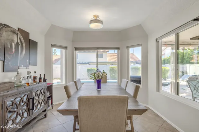 a view of a dining room with furniture window and outside view