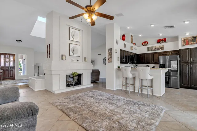 a living room with furniture and a rug