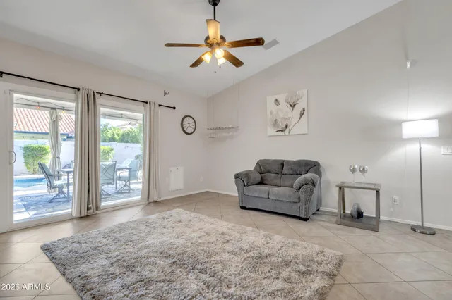 a living room with furniture and a couch