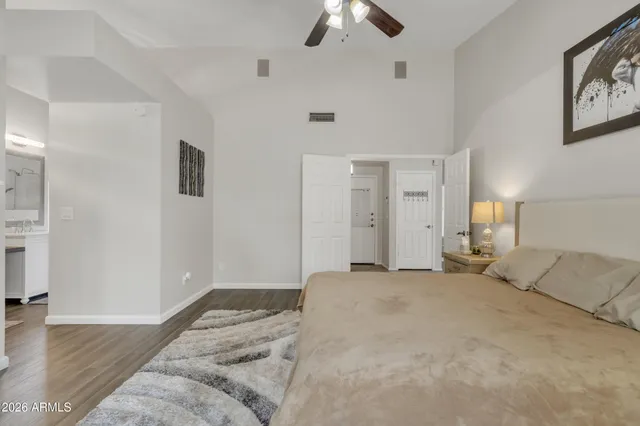 a bathroom with a sink double vanity and a mirror