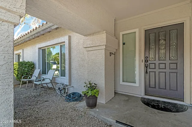 a kitchen with stainless steel appliances granite countertop a refrigerator sink and microwave