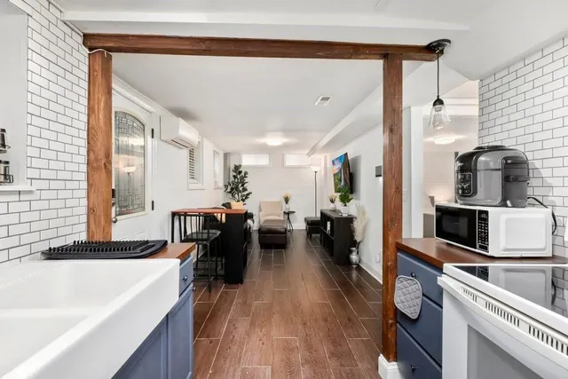 a view of a living room and dining room