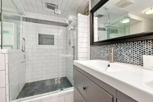a bathroom with a sink and a bathtub